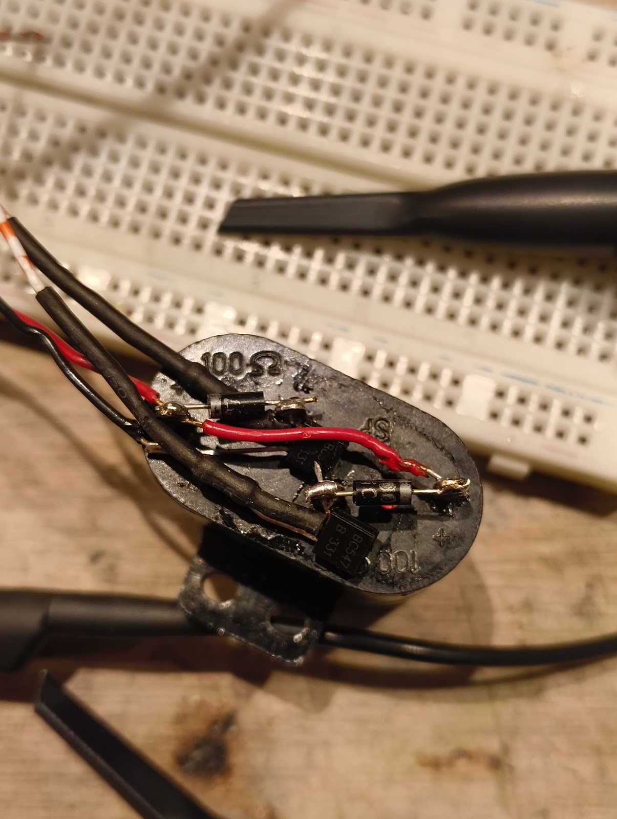 Ah, inductive loads. Learned something new. Let's add some flyback diodes.